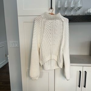 Size small free people sweater. Only worn once for photo shoot with tags.